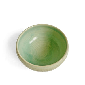 Pale green celadon glazed bowl with chattered pattern