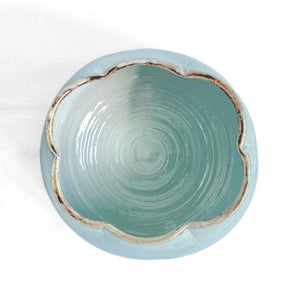 Turquoise blue celadon glazed scalloped edge pot with crystal bloom